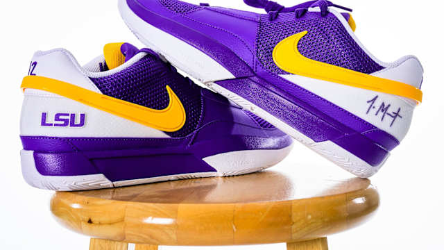 Side view of Ja Morant's purple and gold Nike sneakers.